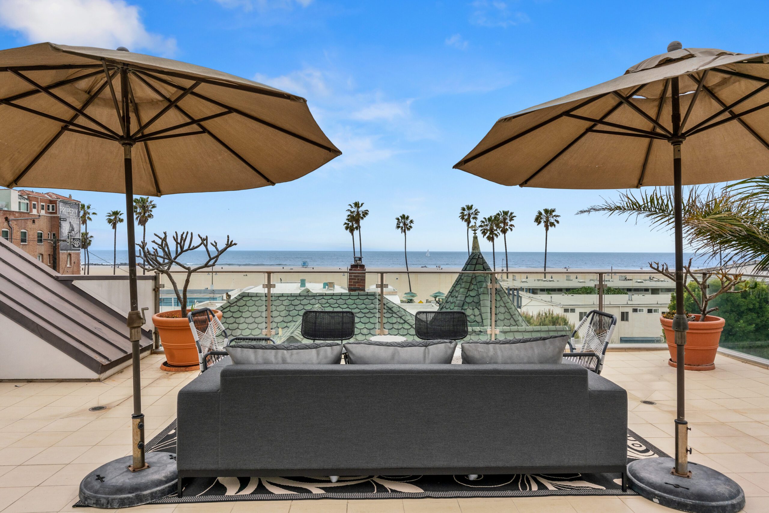 Enjoy the beach views, steps from the sand from the gorgeous rooftop deck.