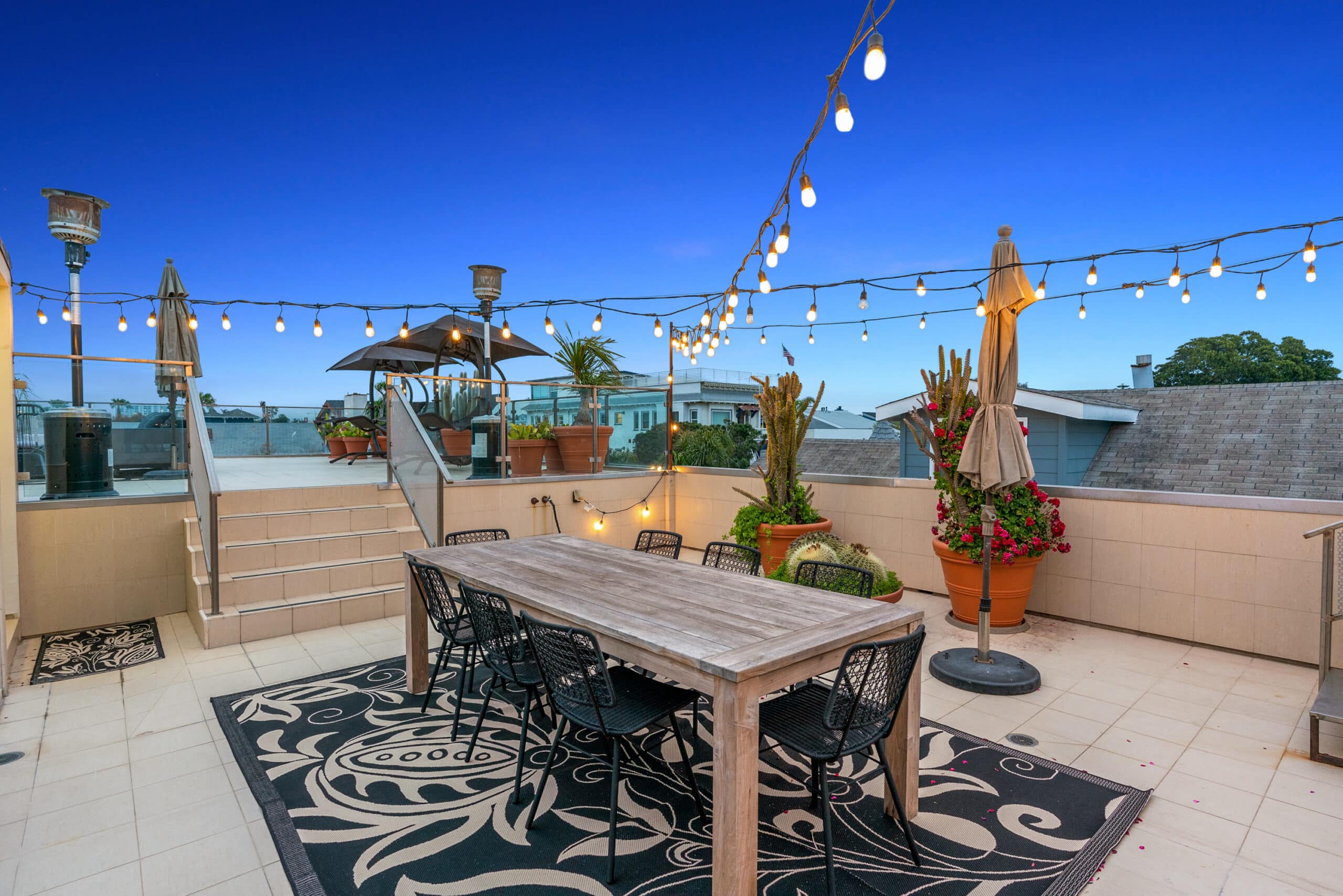 Experience outdoor dining with ocean views from the rooftop deck.